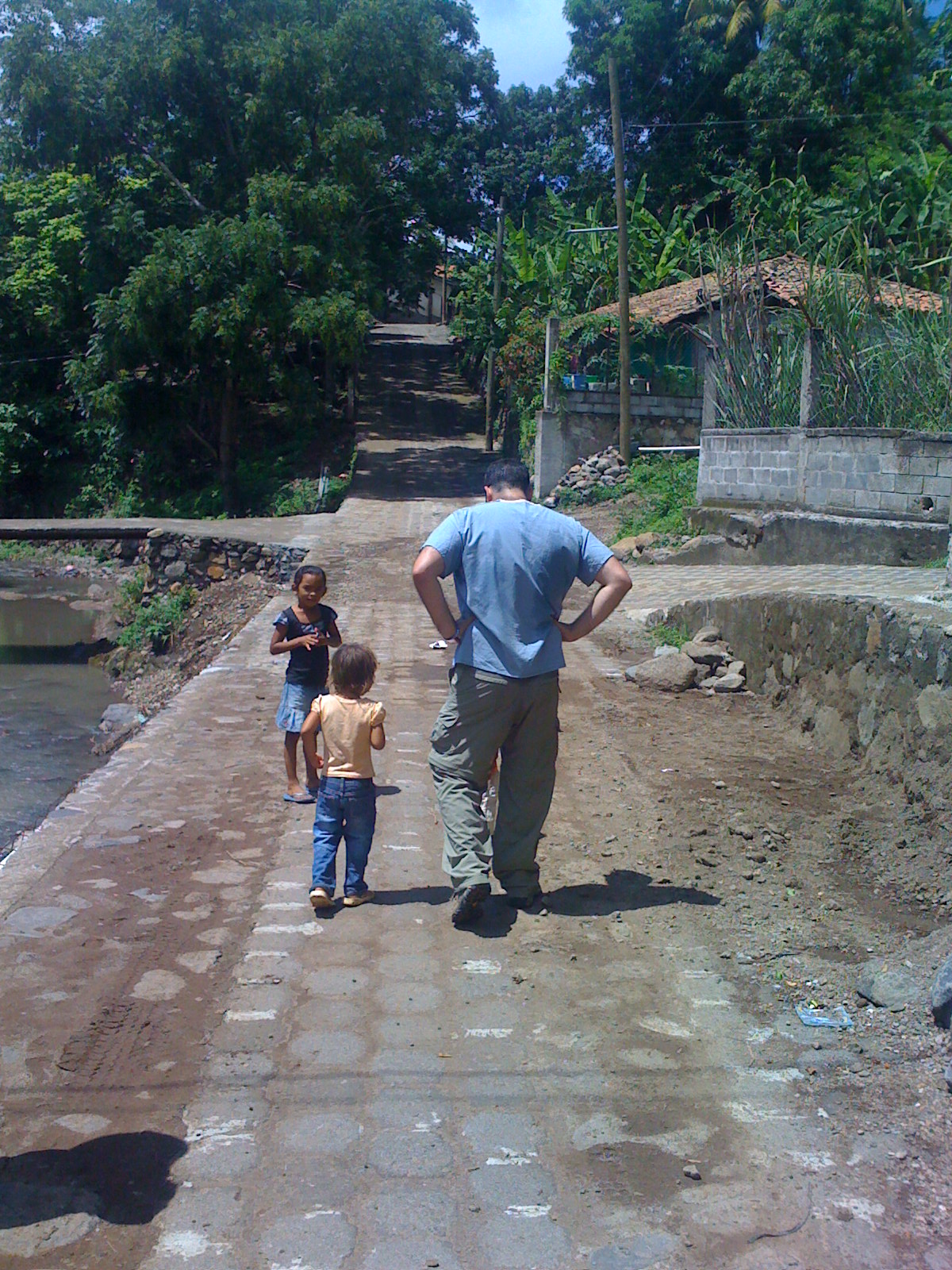 Honduras Brigade - Walking with Children on a path